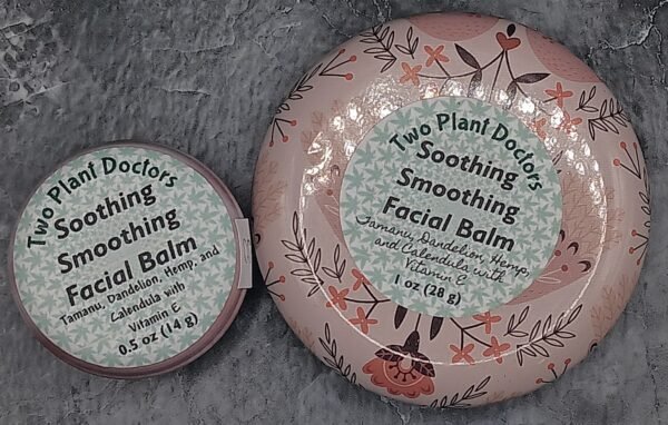 One small and one larger tin of Soothing Smoothing Facial Balm with front label
