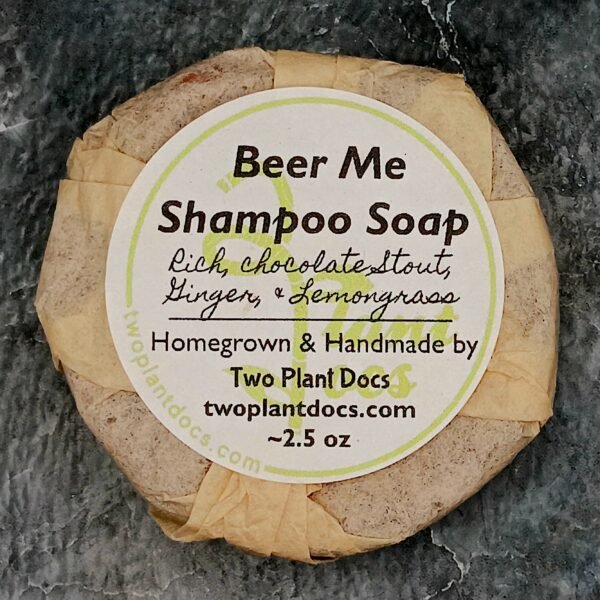 One round Beer Me Shampoo Soap wrapped in unbleached coffee filter