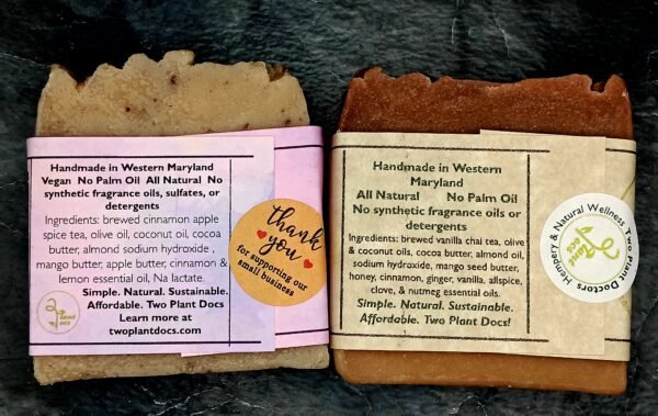Back of two square soaps. One Sweet Cinnamon Apple Pie Soap and one Spicy Vanilla Chai Soap.