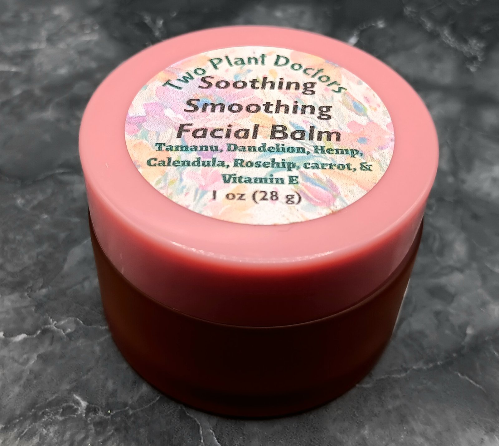 Side view of a pink jar with pink lid