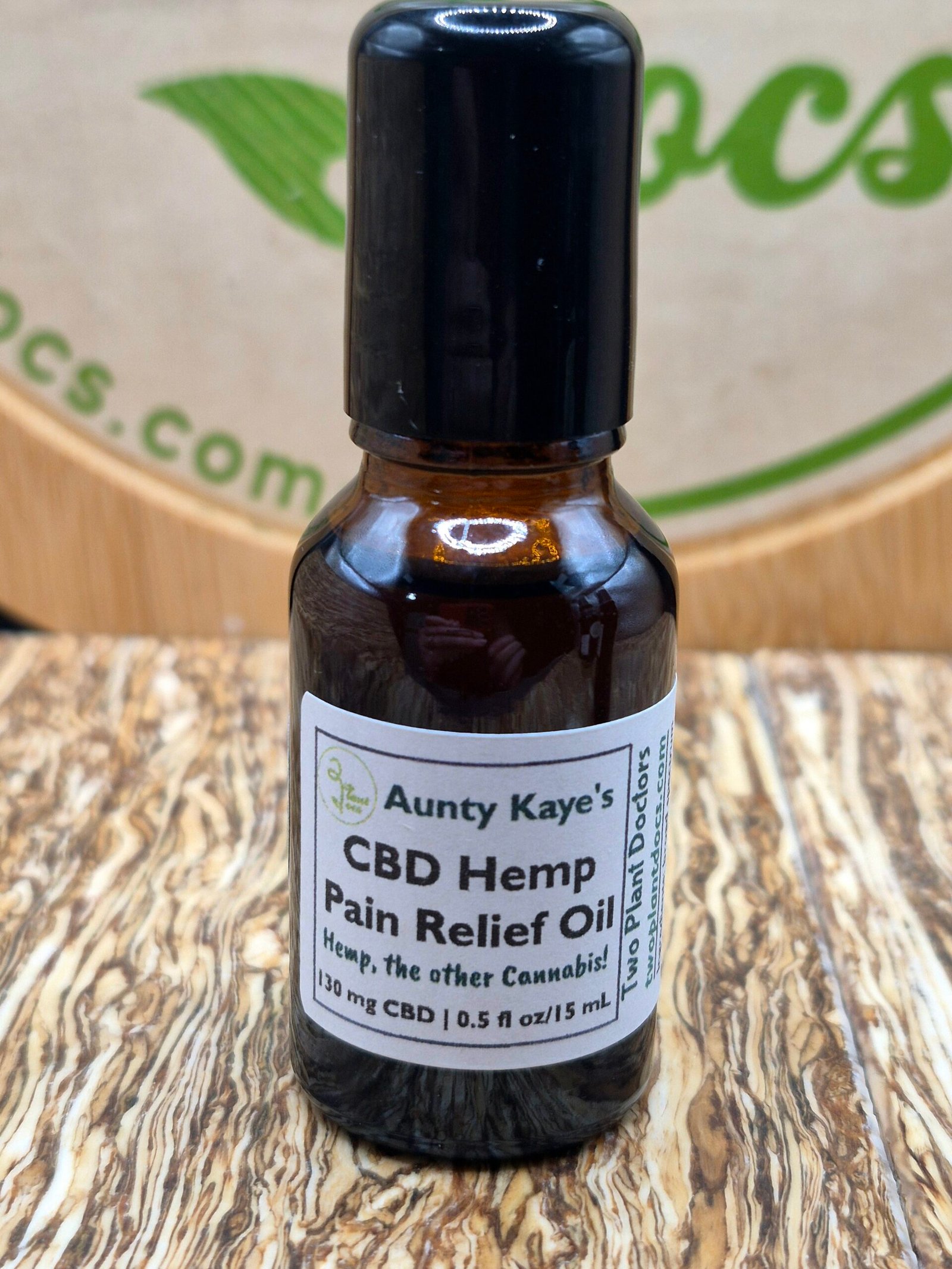 one small glass bottle (1/2 oz) with roller ball top