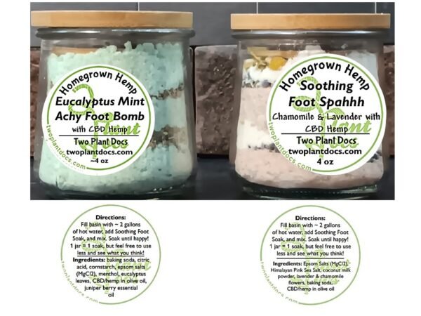 two small glass jars containing colored powders and herbs