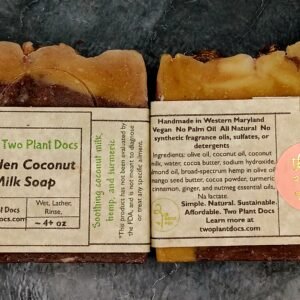 Two square Golden Coconut Milk Soaps that are brown and gold