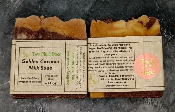 Two square Golden Coconut Milk Soaps that are brown and gold