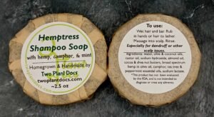 Two round Hemptress Shampoo Soaps with hemp, camphor, and mint
