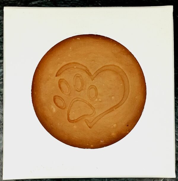 Brown soap with heart and pawprint. This is Leonard's Neem Oil Pet Soap