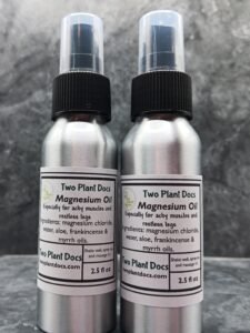 Two aluminum spray bottles