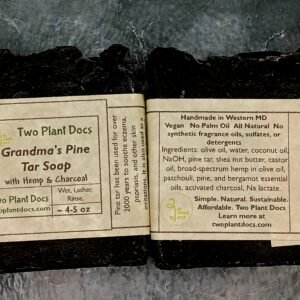 Two square black Grandma's Pine Tar Soaps
