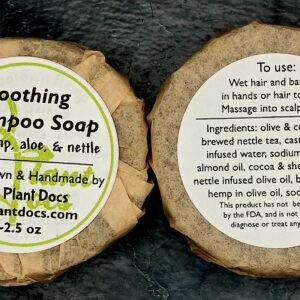Two round Soothing Shampoo Soaps with hemp, aloe, and nettle.