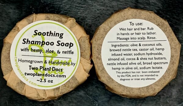 Two round Soothing Shampoo Soaps with hemp, aloe, and nettle.