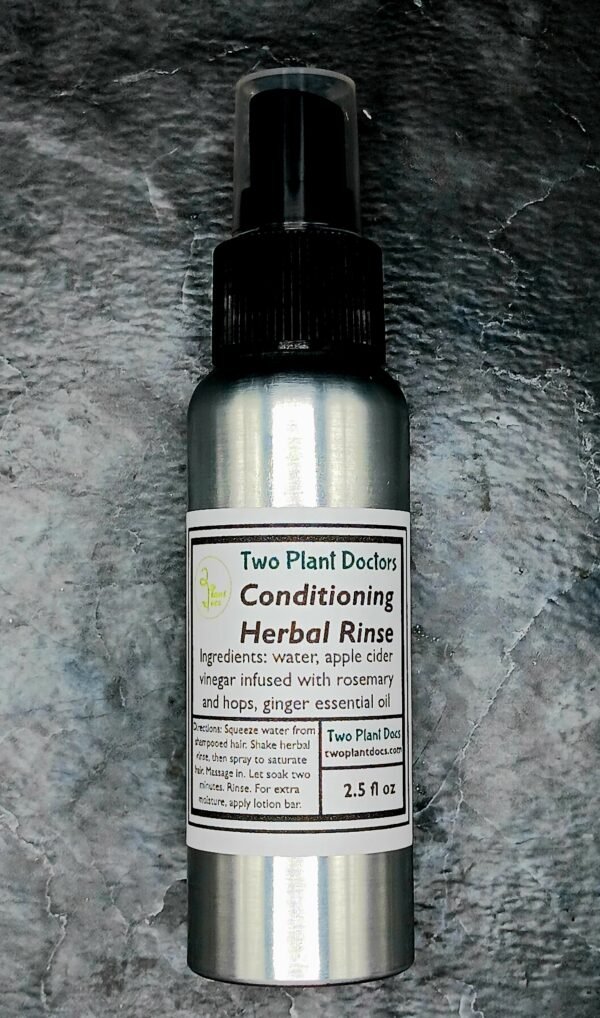 Aluminum spray bottle with a black lid