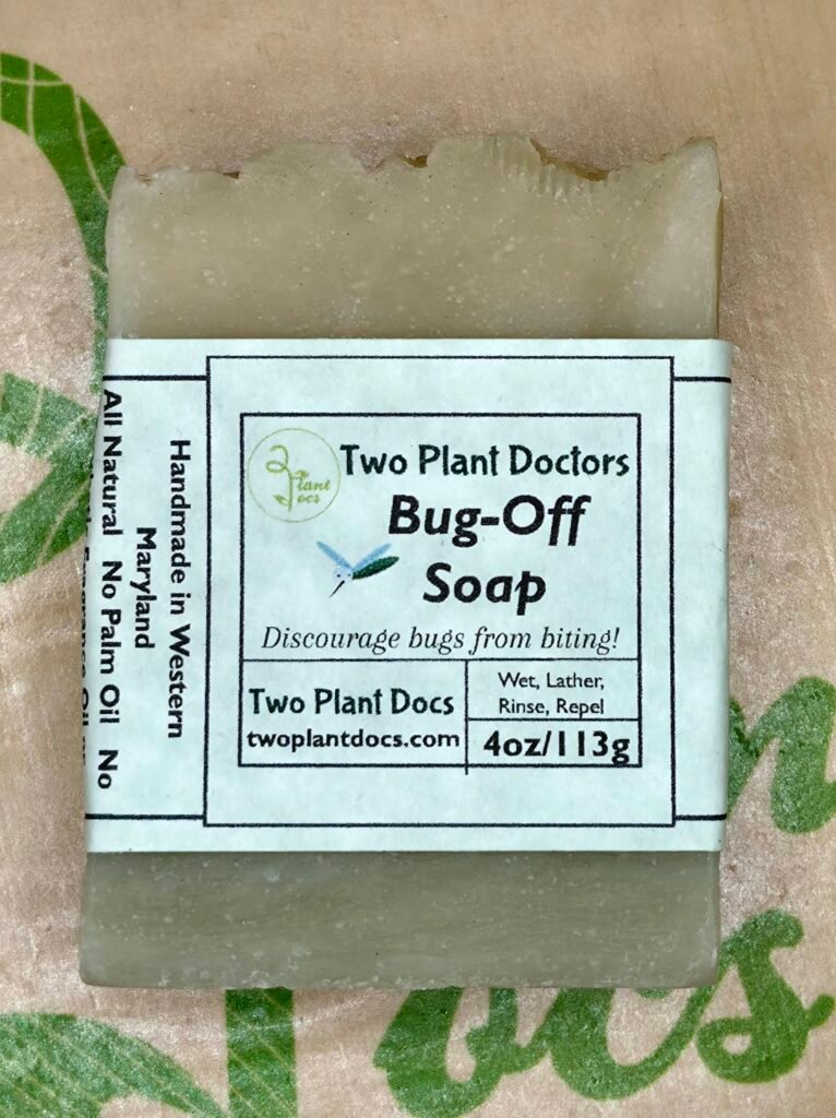 Front of a light green soap with label