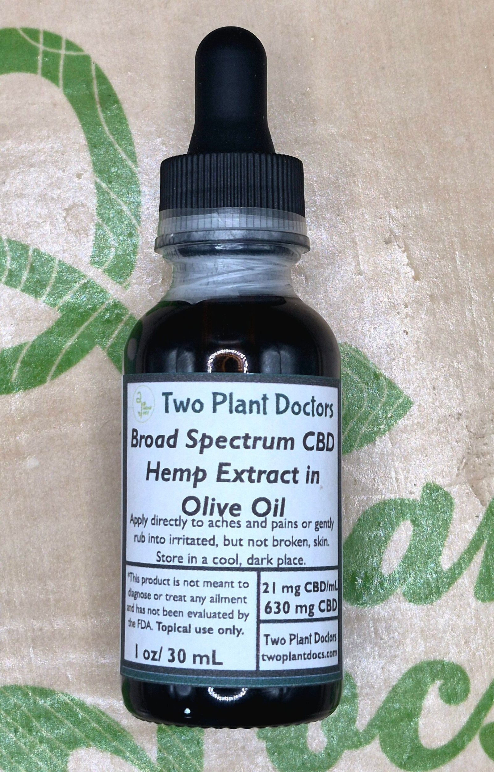 small brown bottle with dropper lid