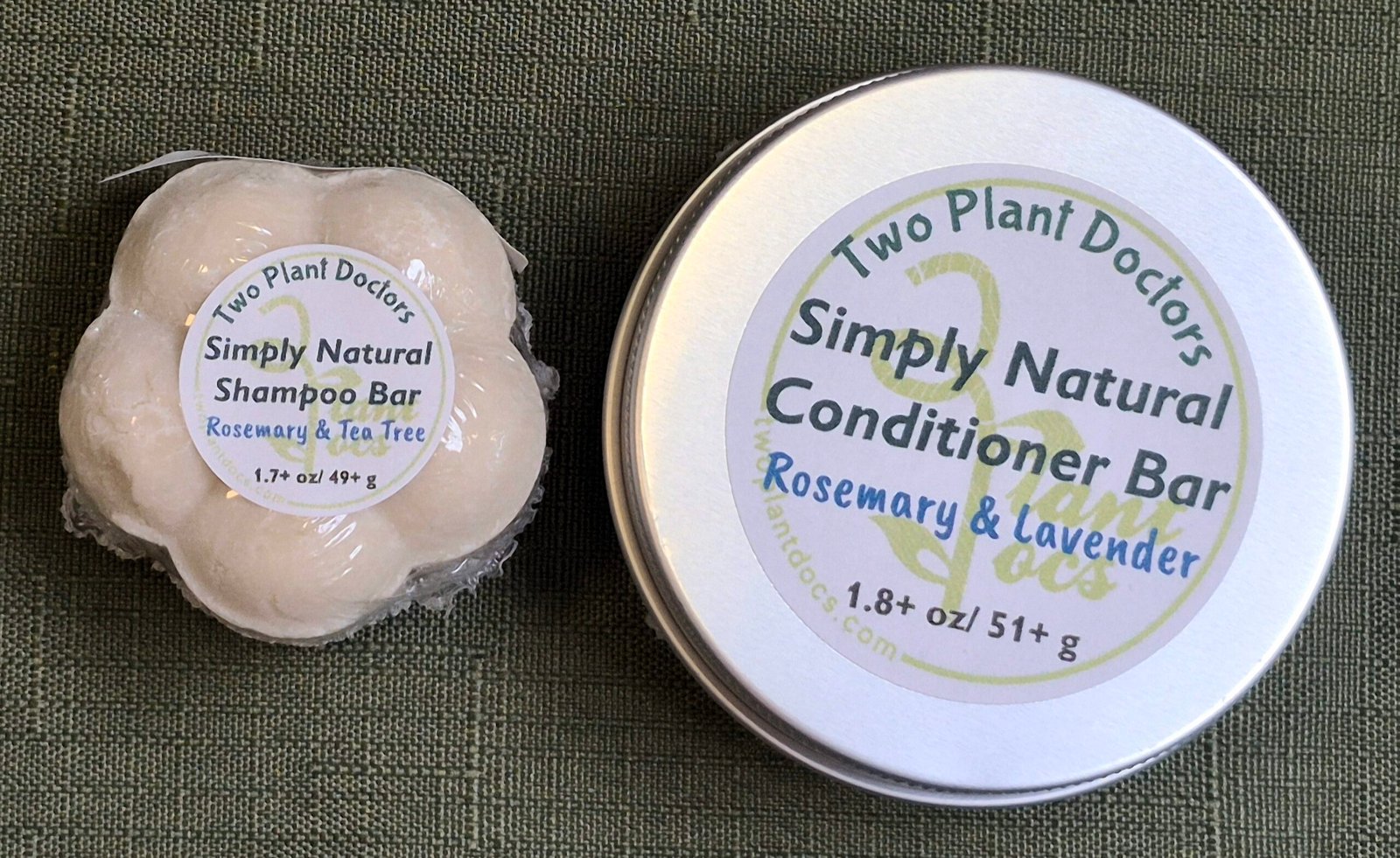 top view of flower shaped shampoo bar and round tin of conditioner bar