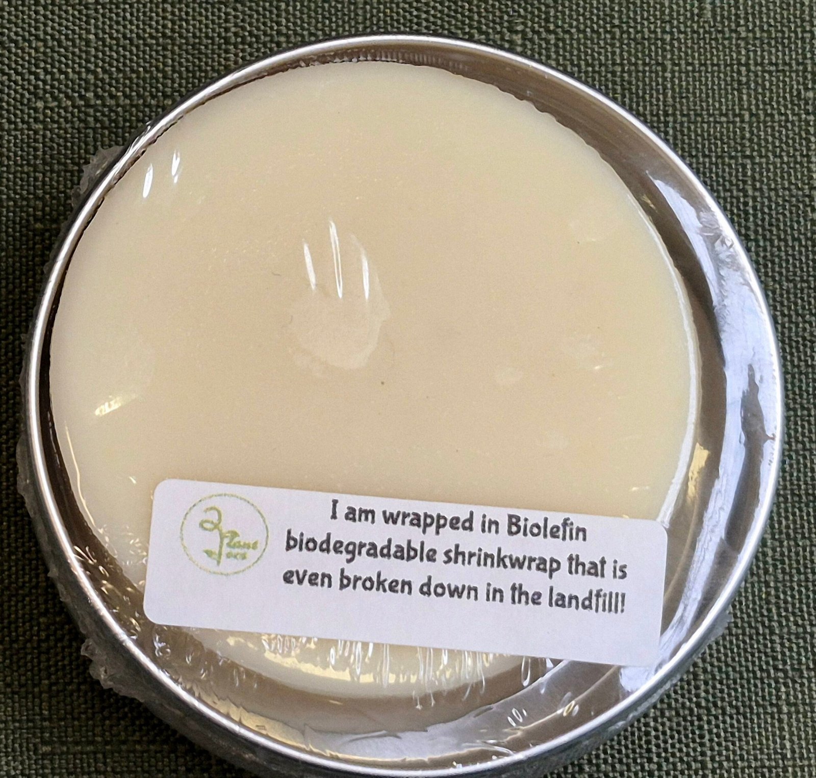 top of round tin with round conditioner bar