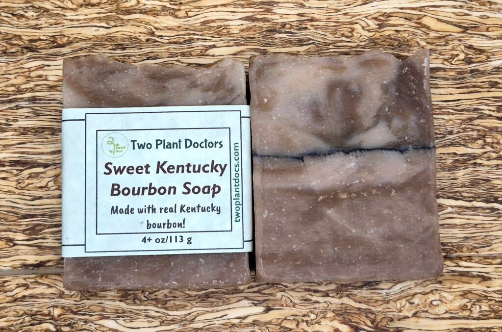Two rectangular soaps on a patterned background